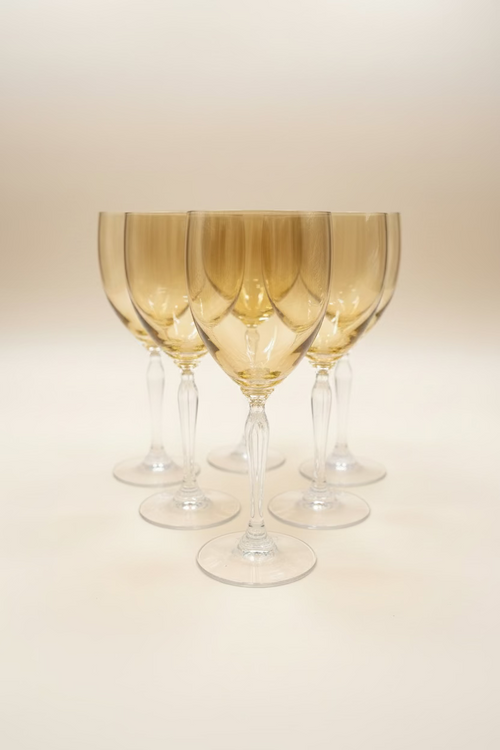 Set of 6 Pier 1 P1C1 amber blown glass water goblets with clear stems in excellent condition on an invory background. 
