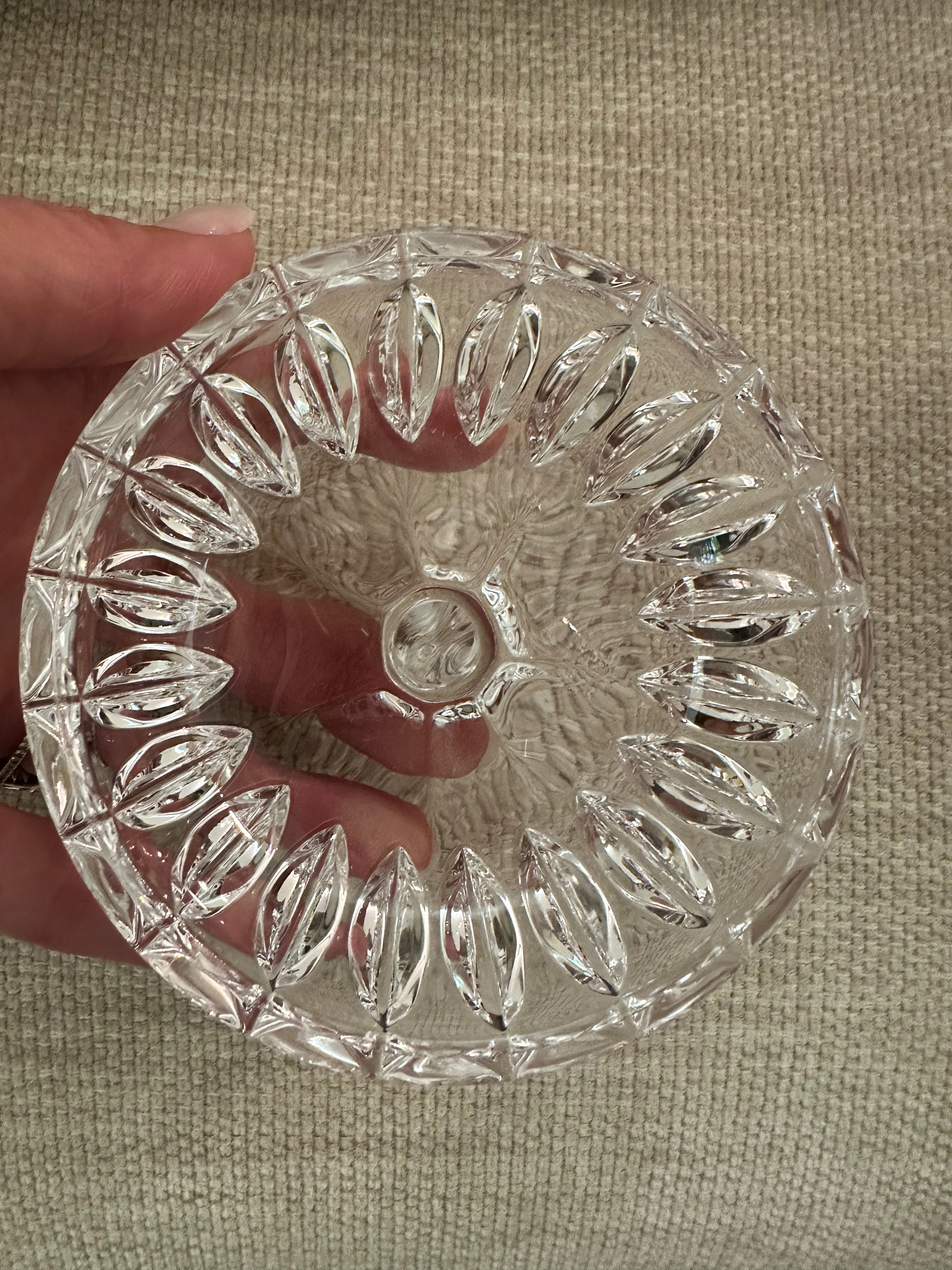 Inside the lid of the Gorham apple candy dish on a woven linen background.