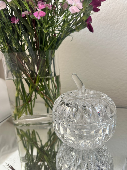 Vintage Gorham lead crystal apple candy dish with lid in discontinued Althea pattern, displayed on a a mirrored tabletop. 